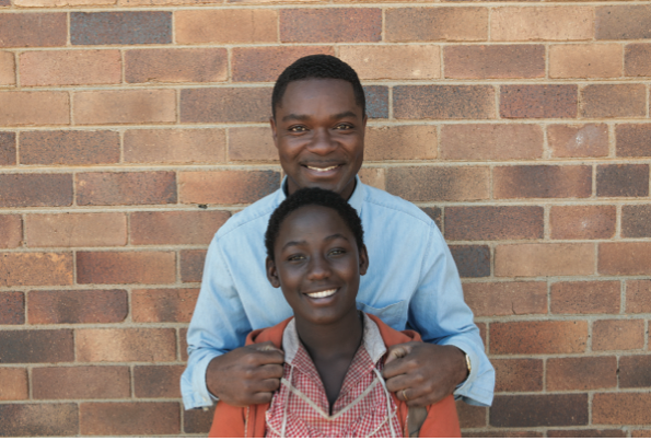 David Oyelowo as Robert Katende and Madina Nalwanga as Phiona Mutesi in Disney’s Queen of Katwe.