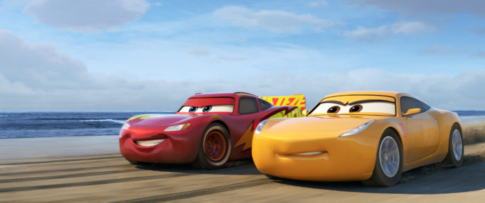 Lightning McQueen (voice of Owen Wilson), alongside elite trainer Cruz Ramirez (voice of Cristela Alonzo). © 2017 Disney•Pixar.