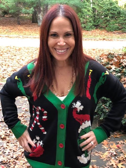 Grinch wearing sweater deals