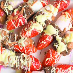 Super easy and yummy Valentines Skewers which the little ones will love! Brownies, strawberries, marshmallows and melted chocolate, just the best combination. No baking required so the clean up is quick! Perfect for your kiddos to make on the day for you all to enjoy. These really are delish so don’t expect there to be any leftovers! Ingredients (to make 8 skewers) Small skewers (or cut the longer ones in half) 100g of milk chocolate 100g of white chocolate 8 ready made brownies (bite size) 8 large marshmallows 8 strawberries (cut in half) Instructions Firstly, cut the end off your strawberries and then slice in half. Next, pop half a strawberry, a brownie, a marshmallow and the other half of the strawberry through the skewer. Little ones may like to put on in any order to make them all slightly different. Break the chocolate up into smaller chunks and put in two seperate microwavable bowls, one for the milk chocolate and one for the white. Pop both bowls side by side in the microwave on a low setting until the chocolate has melted. Make sure to stop and stir regularly. Here comes the fun part! Let your kids go wild with drizzling (or dolloping) both chocolates over all the skewers, the messier the better! You will have leftover melted chocolate which you can now dip the skewers in and enjoy. Chocolate overload… yum! If you have any skewers left over (we didn’t - they were gobbled up quickly) you could transfer the remaining skewers into the fridge and the chocolate will set and harden to enjoy at a later time.